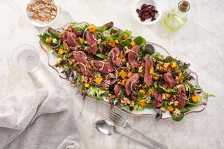 Steak with lentil and pumpkin salad